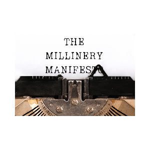 Vintage typewriter with 'The Millinery Manifesto' text on a white background